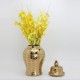 Cerámica, dorada, inserciones florales decorativas, adornos florales